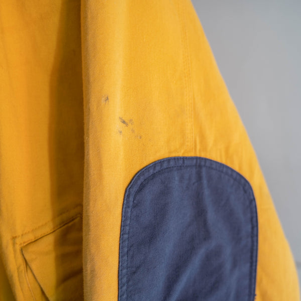 1990s yellow bomber jacket with elbow patch