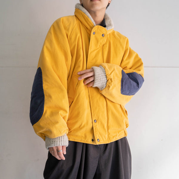 1990s yellow bomber jacket with elbow patch
