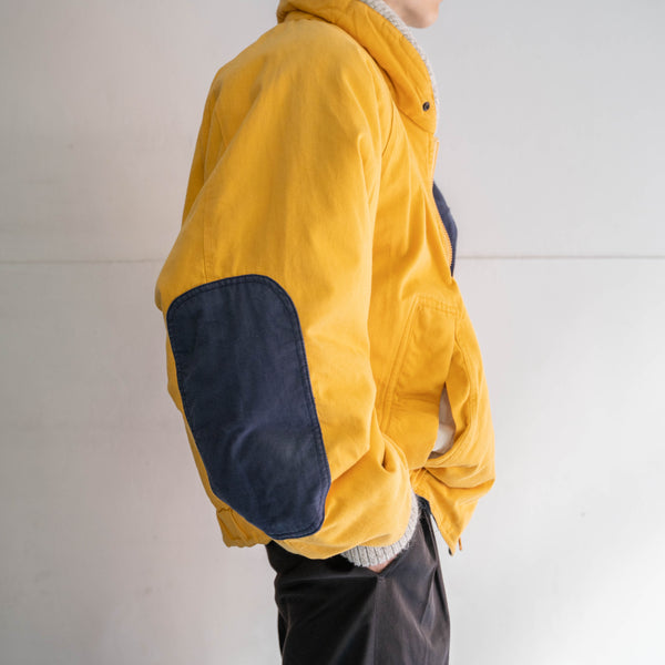 1990s yellow bomber jacket with elbow patch
