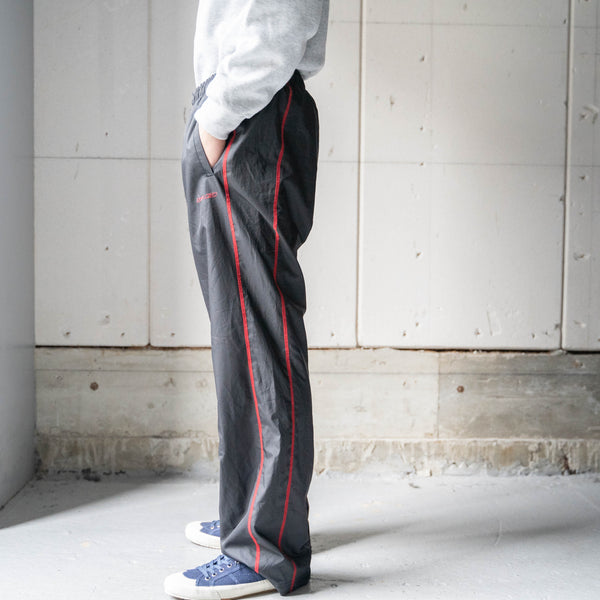 2000s 'Reebok' black color side line design track pants