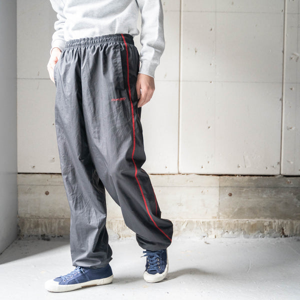 2000s 'Reebok' black color side line design track pants