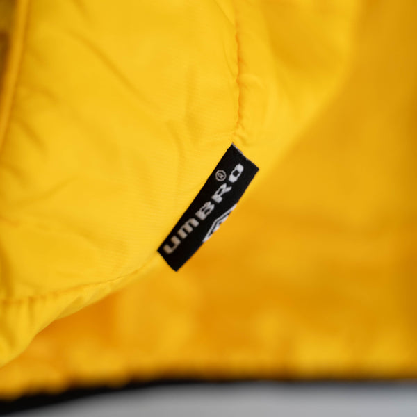 2000s 'UMBRO' black × yellow reversible padded jacket