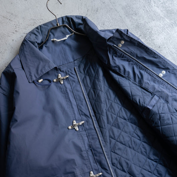 1990s blue PVC fireman jacket