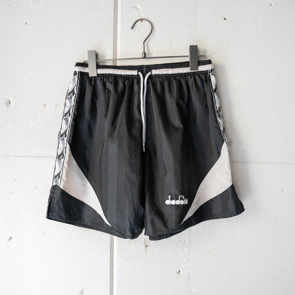 2000s 'DIADORA' black nylon track short pants