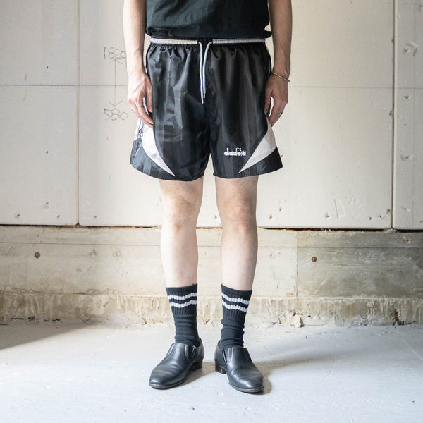 2000s 'DIADORA' black nylon track short pants