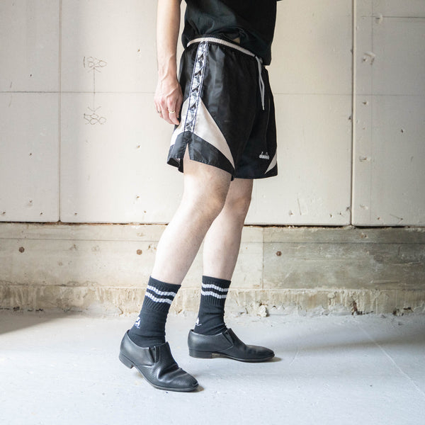 2000s 'DIADORA' black nylon track short pants