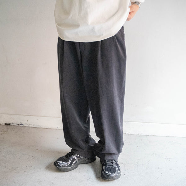 around 1980s Japan vintage black poly 100 weavy pants