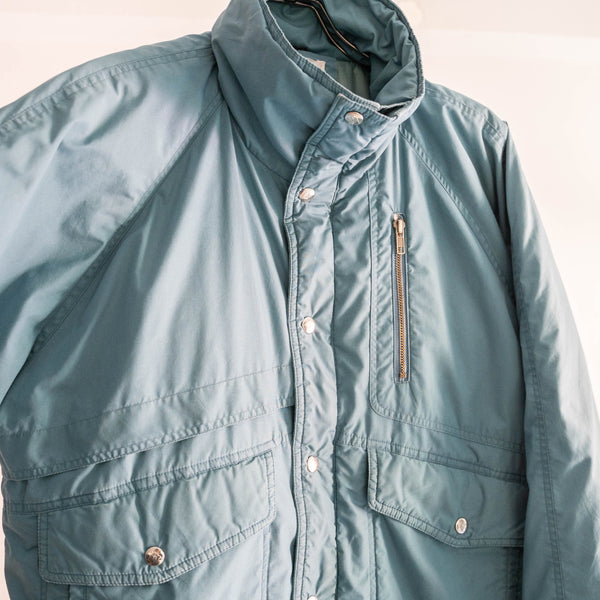 around1990s turquoise blue color stand neck down jacket