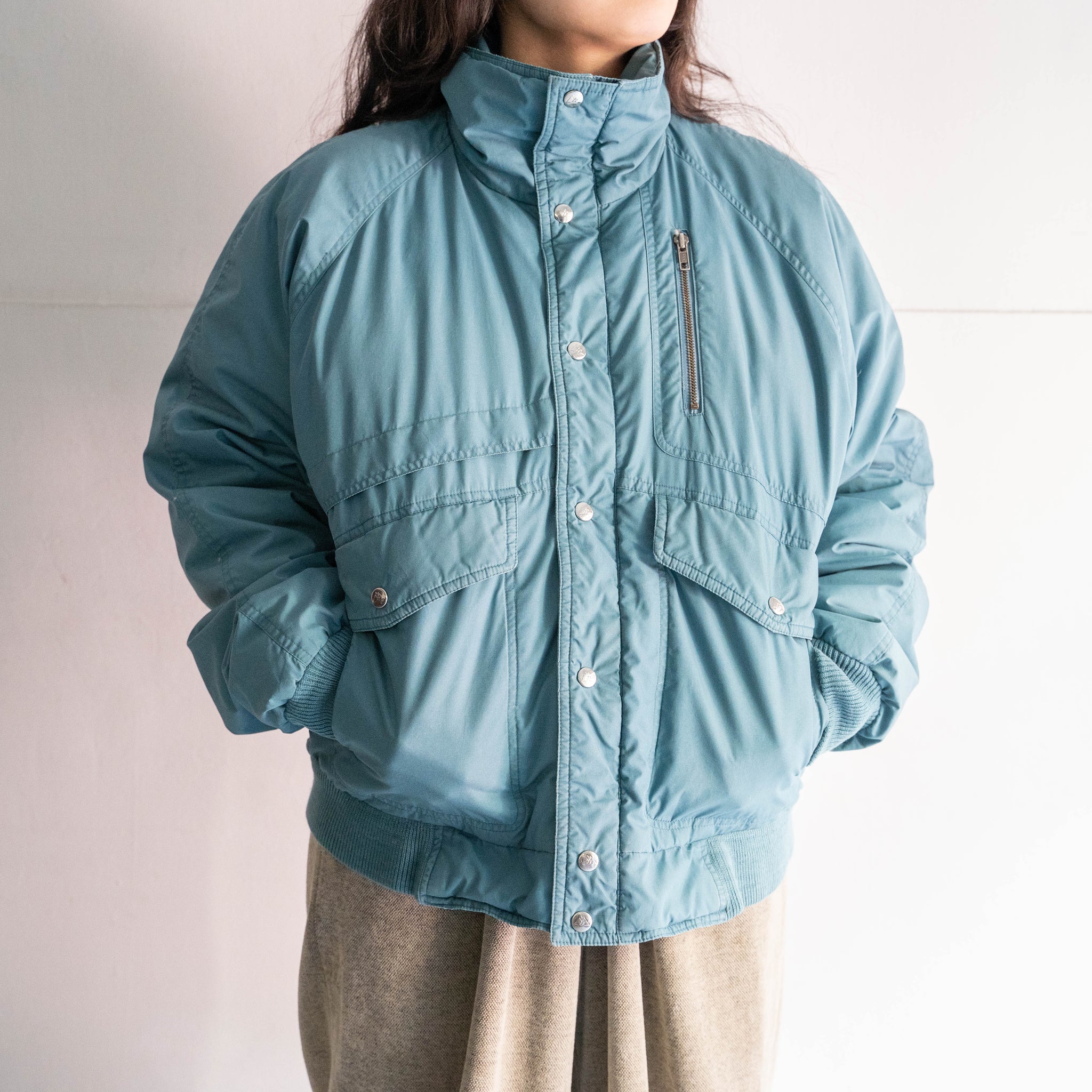 around1990s turquoise blue color stand neck down jacket