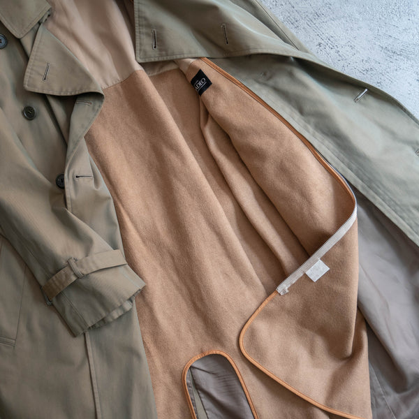 around 1980s Japan vintage TAMAMUSHI trench coat with belt